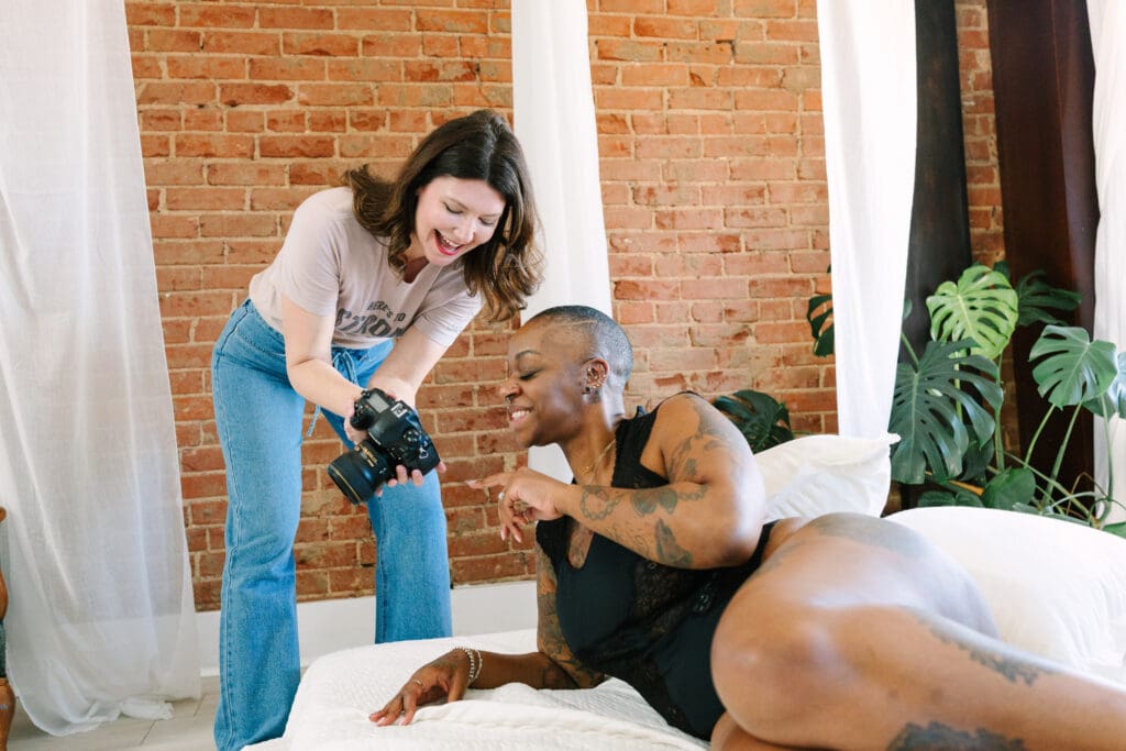 Woman laughing during her Oklahoma City boudoir session