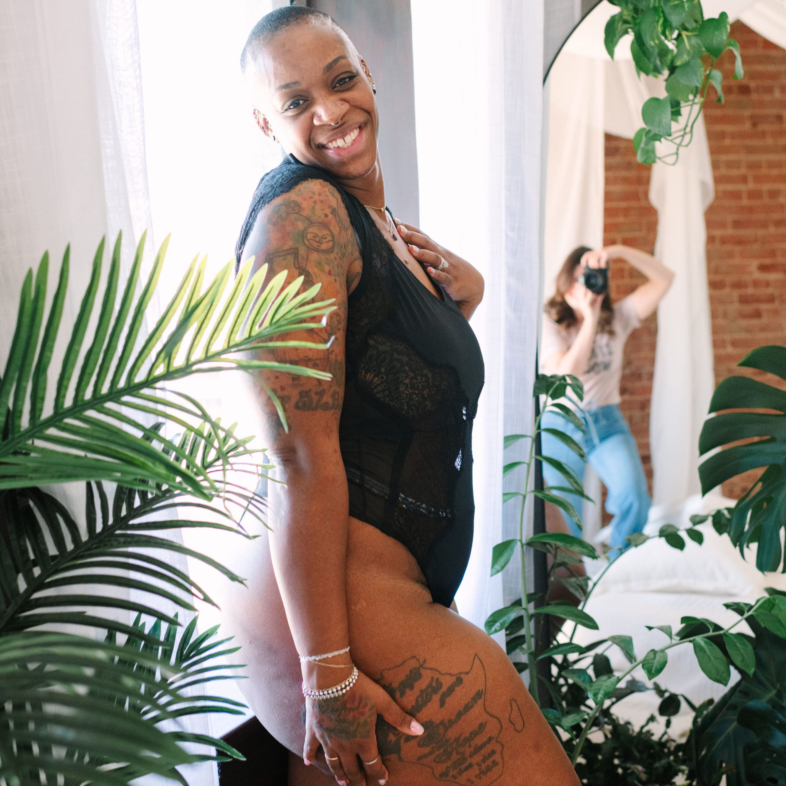 Woman celebrating her body through boudoir photography