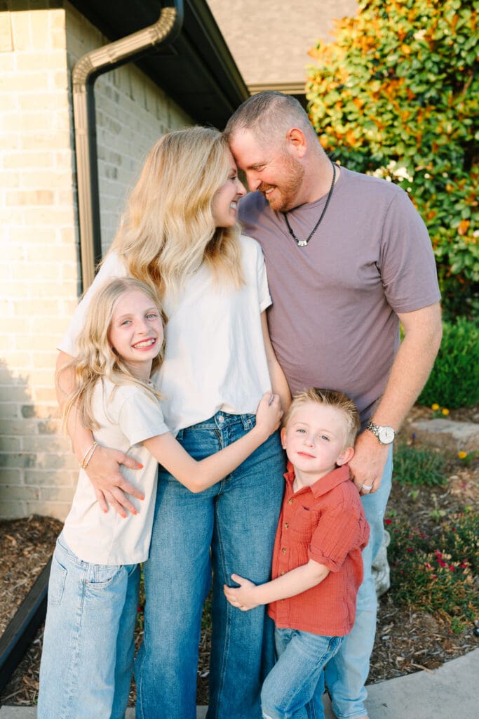 Family of four during an at-home lifestyle photography session in Oklahoma City